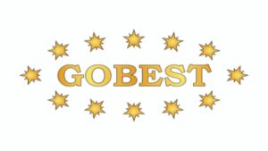 Logo firmy Gobest. Złoty napis Gobest otoczony złotymi gwiazdkami.