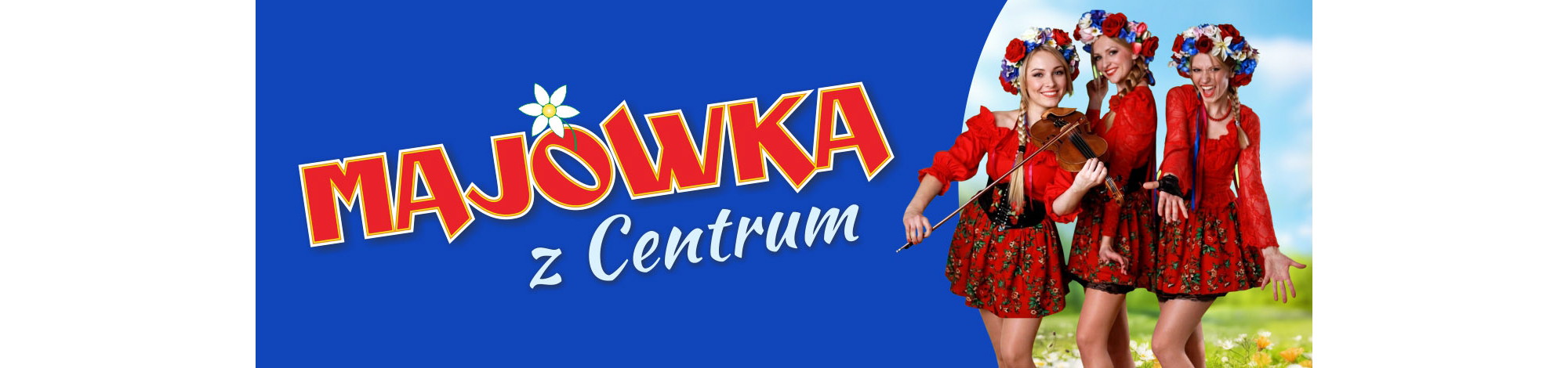Baner „Majówka z Centrum” na niebieskim tle, z kolorowym napisem i trzema uśmiechniętymi kobietami w czerwonych, ludowych strojach z wiankami na głowie; jedna trzyma skrzypce.